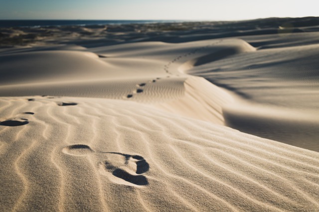 footsteps in sand