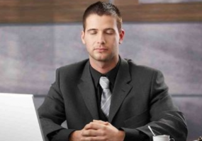 Man practicing mindfulness at work